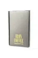 Iron Coffee dark roast beans next to a black coffee mug